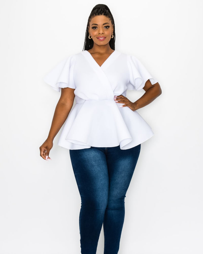 Front of a model wearing a size 1X Siobhan Peplum Top in White by L I V D. | dia_product_style_image_id:241656